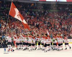 JOE THORNTON WAVING TEAM CANADA FLAG GOLD MEDAL 2010 8X10 PHOTO